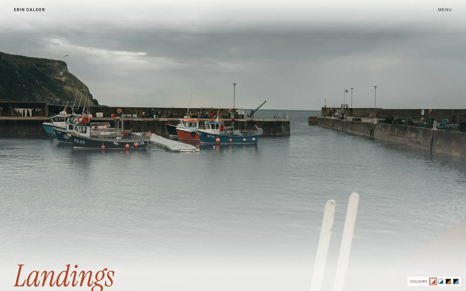 Calder photographer homepage with a moody harbour scene of fishing boats under the Landings title